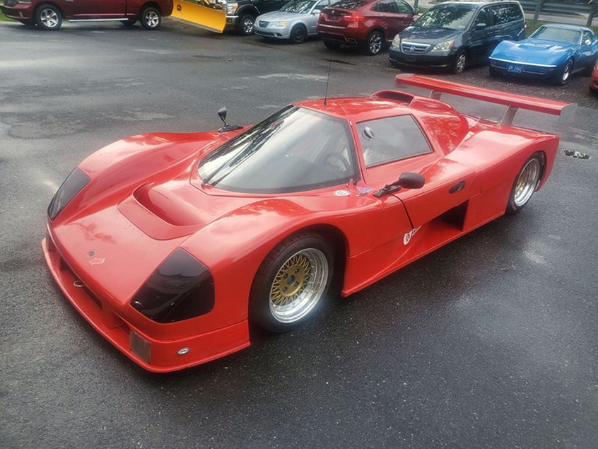 Red racing-style car photographed at Mt. Airy Motors in Mount Airy, Maryland